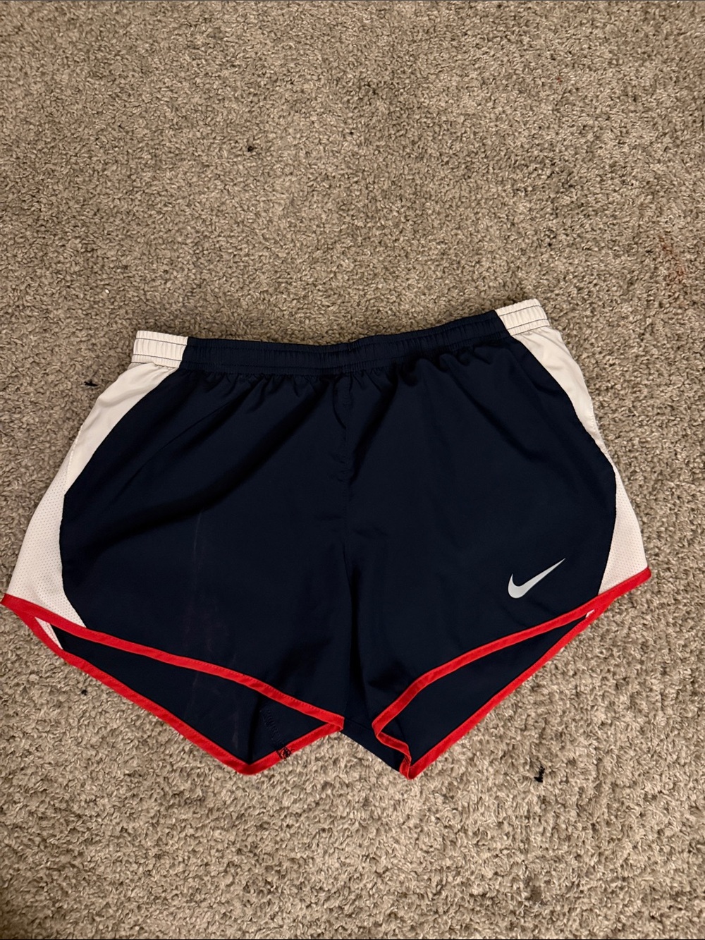 Nike Women's Navy Athletic Shorts with White Panels and Red Trim